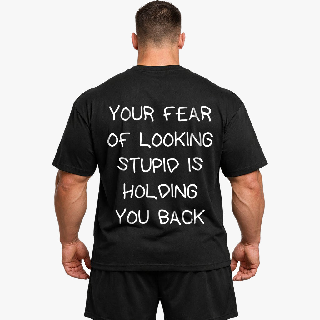 YOUR FEAR OF LOOKING STUPID IS HOLDING YOU BACK Oversized (Backprint) Shirt